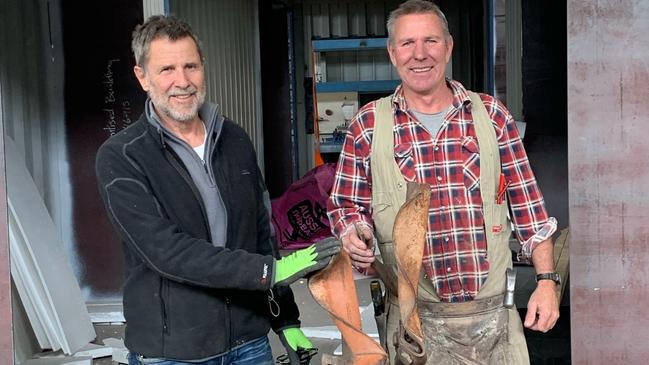 Builder Steve Campbell (right) pictured with architect Nonda Katsalidis, who helped him design his sculpture using metal from the West Gate Bridge collapse.