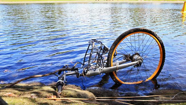 An oBike discarded along the Yarra River in Melbourne. Picture: Aaron Francis