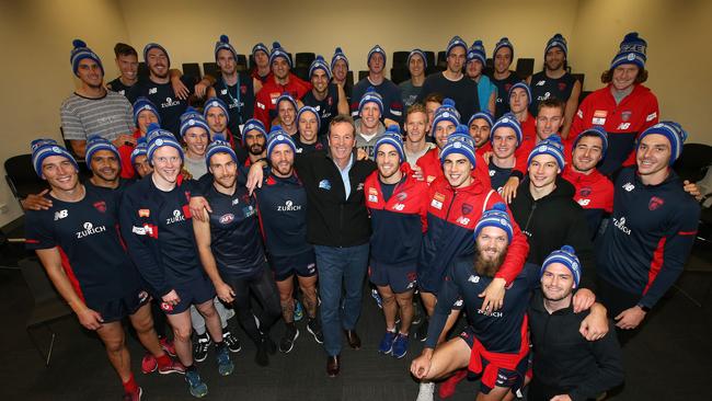 Neale Daniher with the entire Melbourne playing list at AAMI Park. Pic: Michael Klein