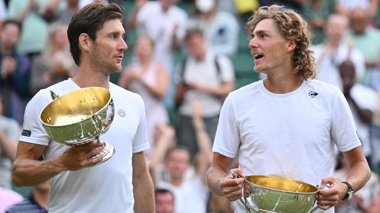 Max Purcell (right) celebrates with Matt Ebden after winning Wimbledon in 2022. Picture: Sebastien Bozon / AFP