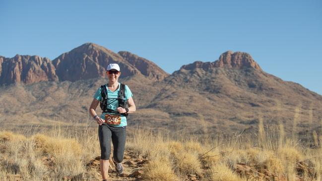 A participant in the 2019 race with the West MacDonnell Ranges in the background