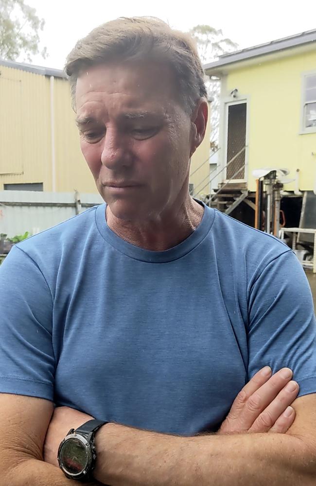 Clean and Green Laundry owner Ian Juleff fears the worst as rain buckets down again in Lismore. His business was hit in the February and March floods. Picture: Gianni Francis