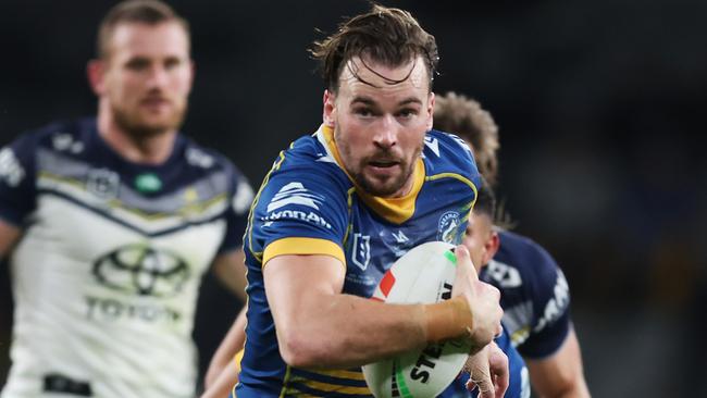 SYDNEY, AUSTRALIA - MAY 26: Clint Gutherson of the Eels makes a break during the round 13 NRL match between Parramatta Eels and North Queensland Cowboys at CommBank Stadium on May 26, 2023 in Sydney, Australia. (Photo by Mark Metcalfe/Getty Images)