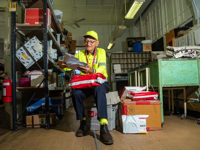 Laidley Post Office contractor Harold Schulz, sorts through some mail. PHOTO: ALI KUCHEL