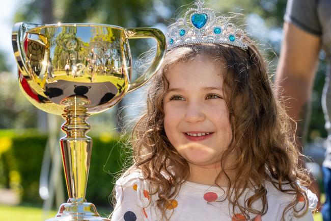 The Cup sparkles for a young Charters Towers resident in Queensland. Picture: Jay Town
