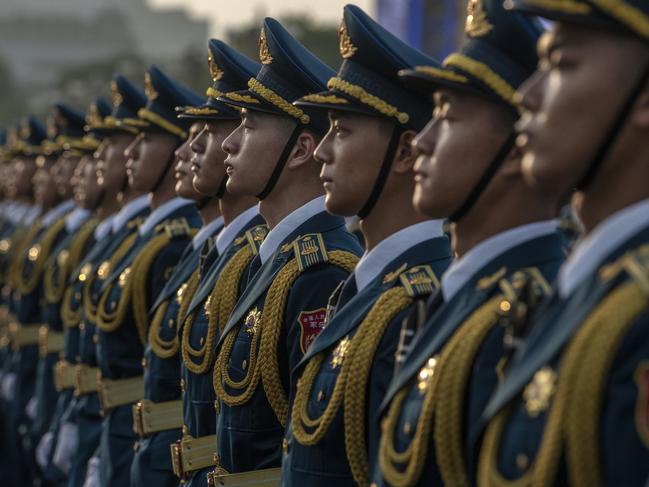 Members of a People's Liberation Army band stand together at a ceremony marking the 100th anniversary of the Communist Party in 2021 at Tiananmen Square in Beijing, China. Picture: Kevin Frayer/Getty Images