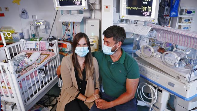 Abigail and Ioannis Delakis with their twins Sophia (left) and Theodore (right) who were born at 28 weeks. Picture: Sam Ruttyn