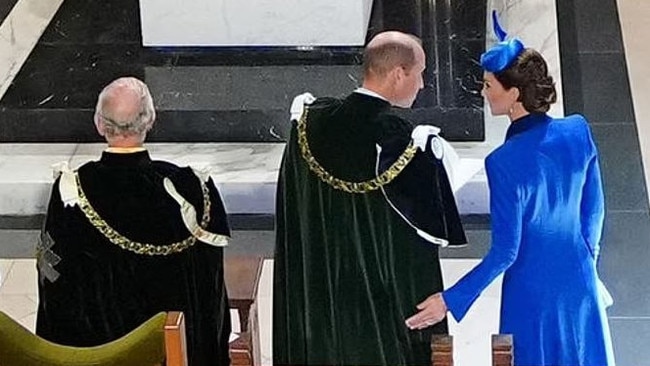 Princess Catherine taps her husband on the behind during a celebration for King Charles’ coronation in Edinburgh. Picture: Supplied