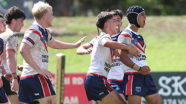 The Roosters celebrate Jack Dean-Potaka’s try. Picture: Sue Graham