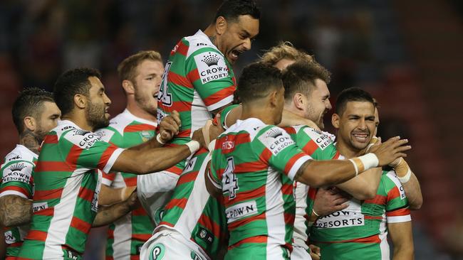 NEWCASTLE, AUSTRALIA — MAY 04: Rabbitohs players celebrate a try from Cody Walker during the round nine NRL match between the Newcastle Knights and the South Sydney Rabbitohs at McDonald Jones Stadium on May 4, 2018 in Newcastle, Australia. (Photo by Ashley Feder/Getty Images)