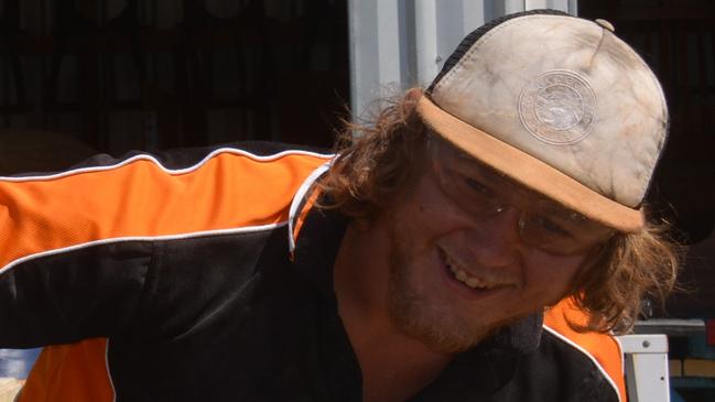 Ross Towell and Trinity Londonweekes giving some old furniture new life to help the community at 'The Village' timber project run by Boots'n Bulldust in Nanango.