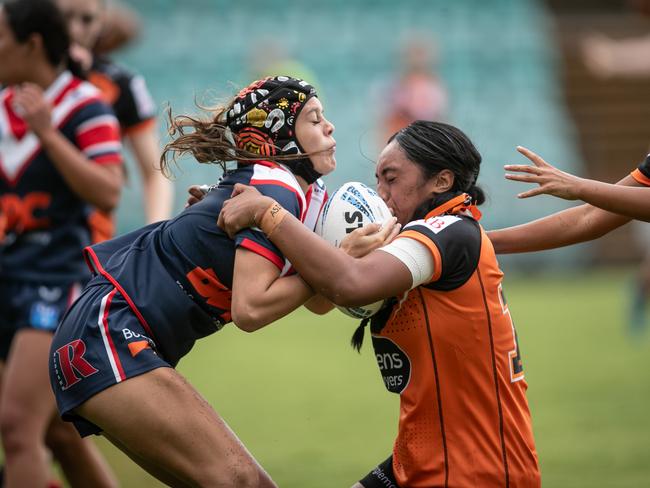 Lucyannah Luamanu-Leiataua brings Bae-Phoenix Kelly to ground. Picture: Julian Andrews