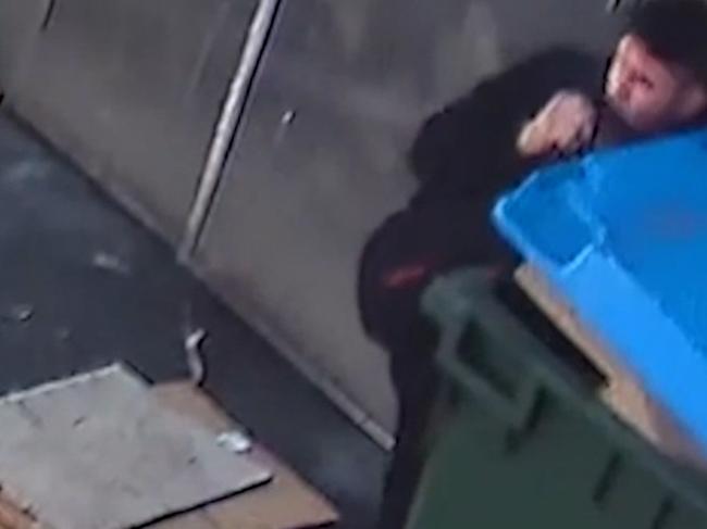 Security cameras caught one of the men hiding in a bin at a fast food restaurant.