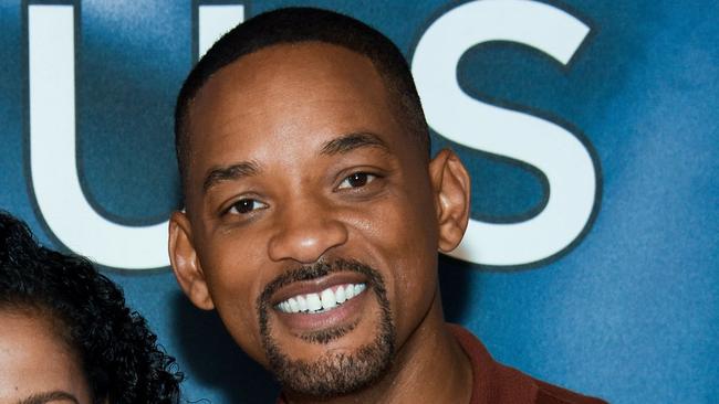 NEW YORK, NY - DECEMBER 14: Gugu Mbatha-Raw and Will Smith attend the 
