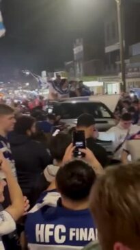 Bulldogs fans partying after defeating the Raiders at Belmore