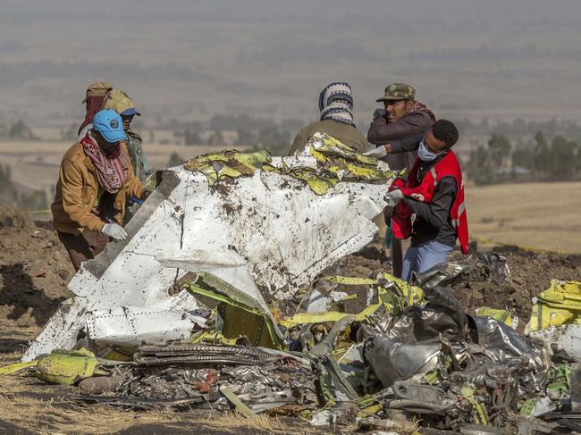 Rescuers work at the scene of an Ethiopian Airlines flight crash near Bishoftu, south of Addis Ababa. Picture: AFP 