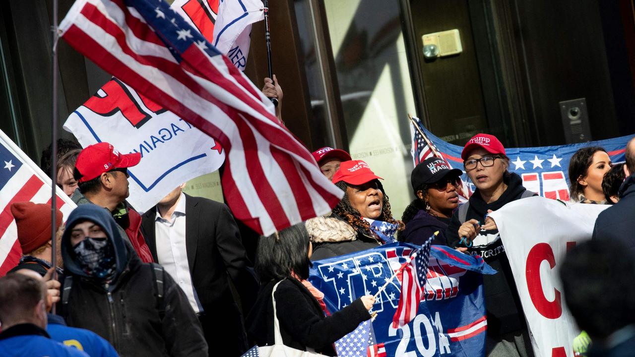 Trump supporters gather at Trump Tower in New York for his arrival. Picture: Stefani Reynolds/AFP