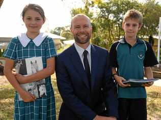 TOP PERFORMER: Cooloola Christian College students Lena Swenson (left) and Riley Kenrick with proud principal Trevor Norman.