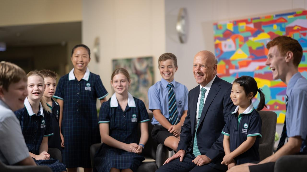 Matthew Flinders Anglican College principal Stuart Meade with students.