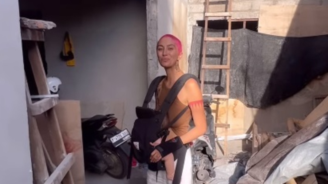 It was a devastating start to 2023 for Aussie mum Honey Ahimsa with her baby girl fighting for her life in Bali. But six months on baby Lucky is ‘happy and healthy’ and the family have moved back to Bali. Picture: Instagram/honeyahimsa