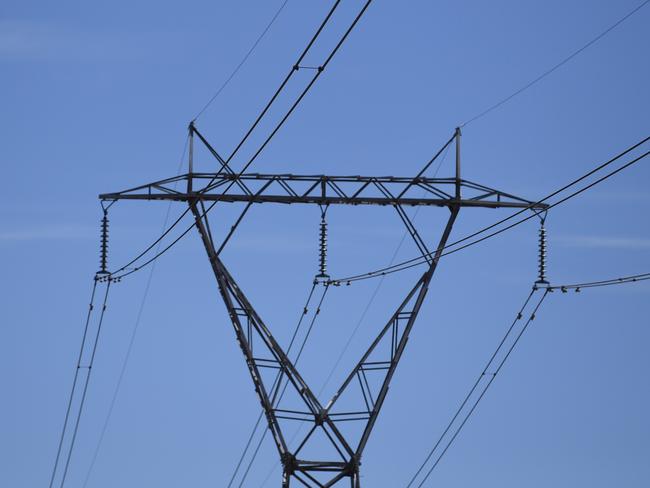 An electricity tower is seen outside Canberra, Friday, Feb. 10, 2017. (AAP Image/Lukas Coch) NO ARCHIVING