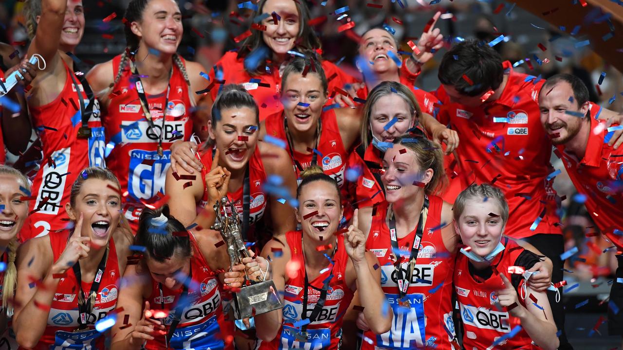 NSW Swifts co-captain Paige Hadley (with right hand on trophy), believes former teammate Sophie Garbin (leaning in behind her with finger raised)