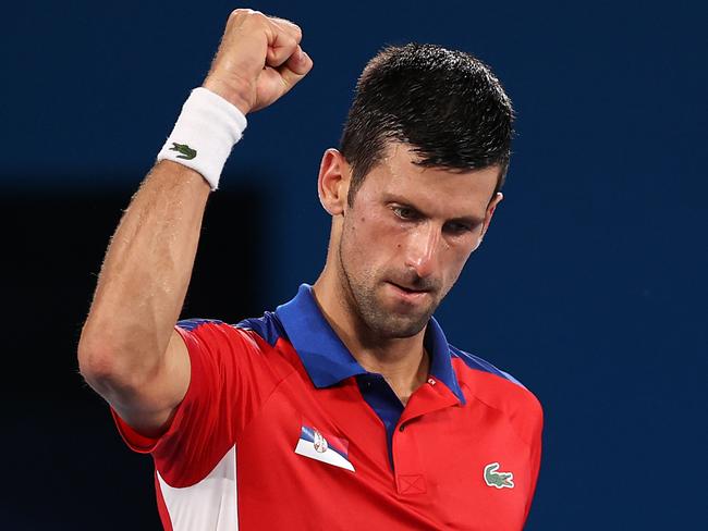 TOKYO, JAPAN - JULY 29: Novak Djokovic of Team Serbia celebrates victory after his Men's Singles Quarterfinal match against Kei Nishikori of Team Japan on day six of the Tokyo 2020 Olympic Games at Ariake Tennis Park on July 29, 2021 in Tokyo, Japan. (Photo by Clive Brunskill/Getty Images)