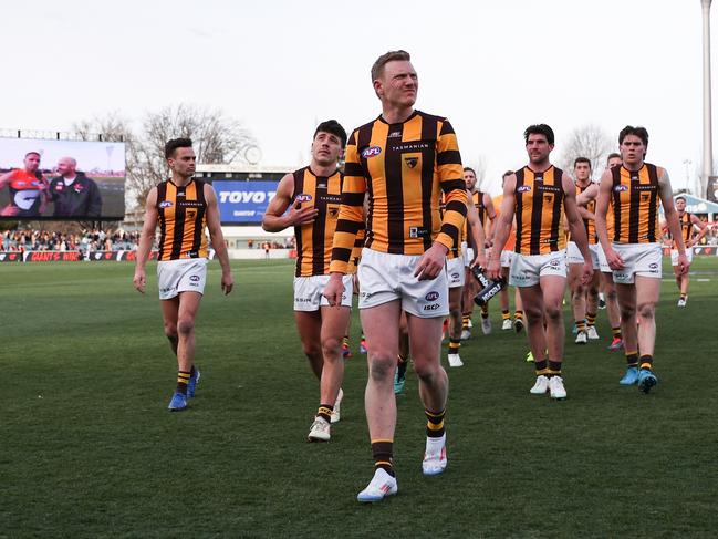 James Silcily leads Hawthorn off Manuka Oval in Canberra. Picture: Brendon Thorne/AFL Photos/Getty Images.