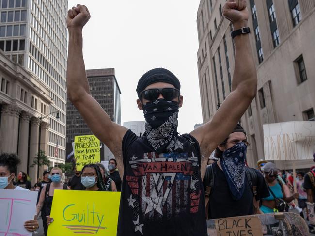 Protesters march during a peaceful demonstration over the death of George Floyd in Detroit. Picture: Seth Herald/AFP