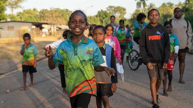 Ludmilla Primary School's attendance and engagement has increased thanks to a partnership with the Bagot Community walking school bus program. Picture: Pema Tamang Pakhrin