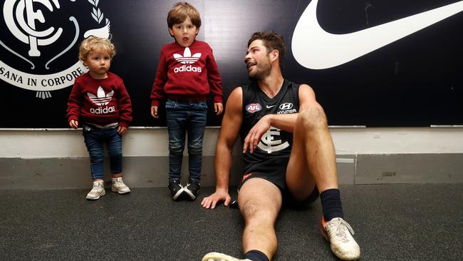 Levi Casboult soaks up the win with a couple of young fans post-match. Picture: Michael Willson/AFL Photos via Getty Images.