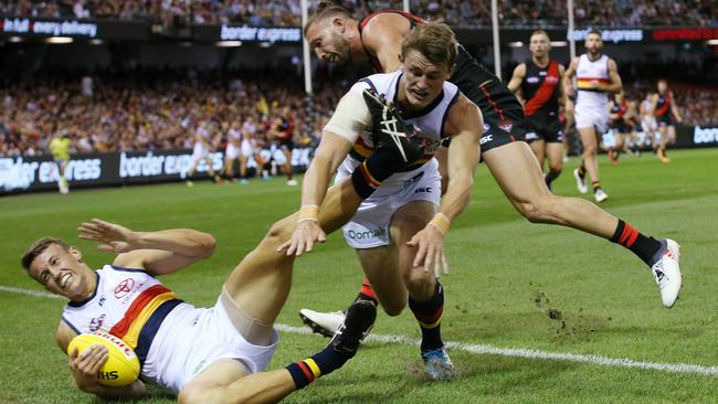 Adelaide's Tom Doedee and Matt Crouch hit the ball hard on Friday night. Picture: Michael Klein