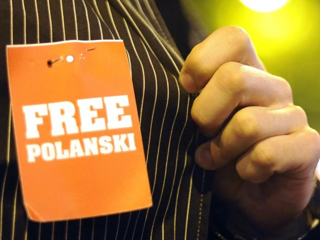 A man shows a "free Polanski" sign on his shirt during the Zurich film festival in 2009. Picture: Sebastien Bozon