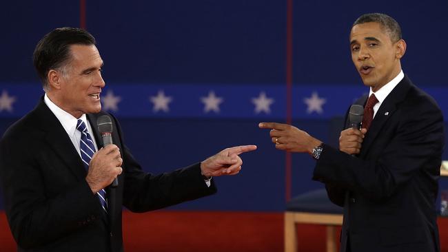 Republican presidential nominee Mitt Romney, left, and President Barack Obama spar during the second presidential debate in Hempstead, New York. Picture: AP.