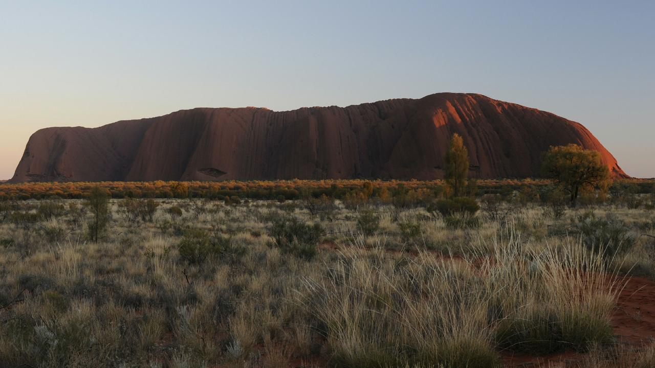 View of Uluru at sunrise from the Talinguru Nyakunytjaku viewing platform.