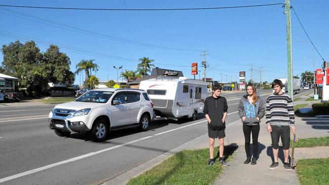 The Bruce Hwy between Hungry Jacks and Pizza Hut in Gympie has been the scene of several accidents between pedestrians and cars in recent years. Jeremy Coman, Kintara Andrews and Haimish Higgins. Picture: Donna Jones