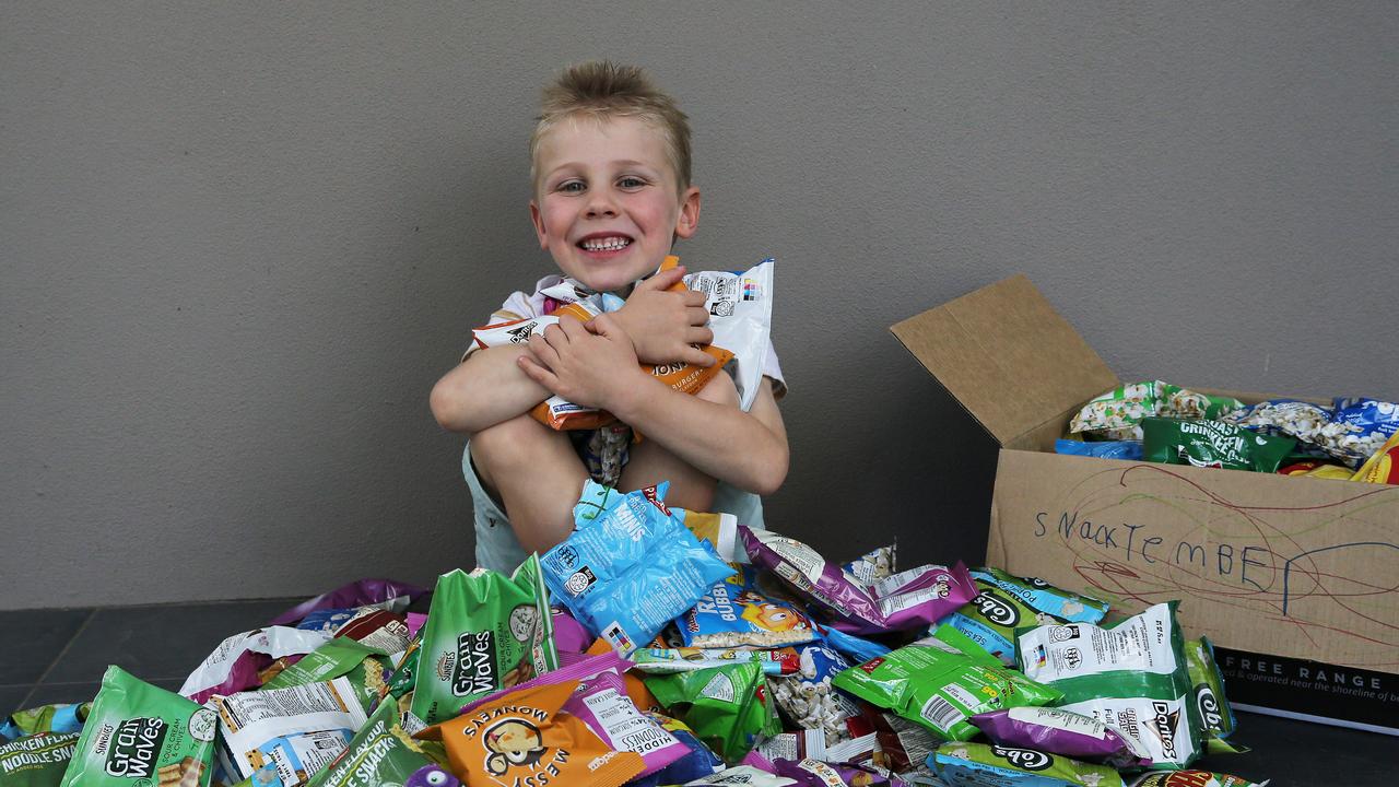 Murrays Beach boy Brodie Porter collecting food for