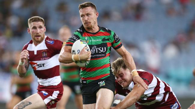 Damien Cook makes a break for the Rabbitohs.