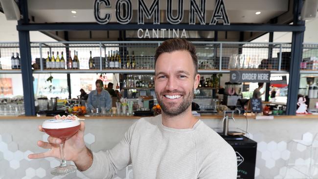 Comuna Cantina Pacific Fair owner Tim Johnson sampling a creation from the cocktail bar. Photo by Richard Gosling