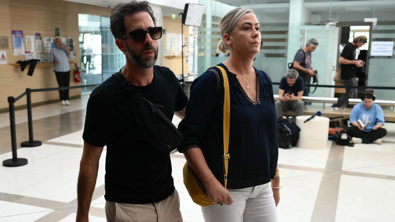 Caroline Darian and her brother Florian P, two children of the accused and the alleged victim, arrive at court. Picture: Christophe Simon/AFP