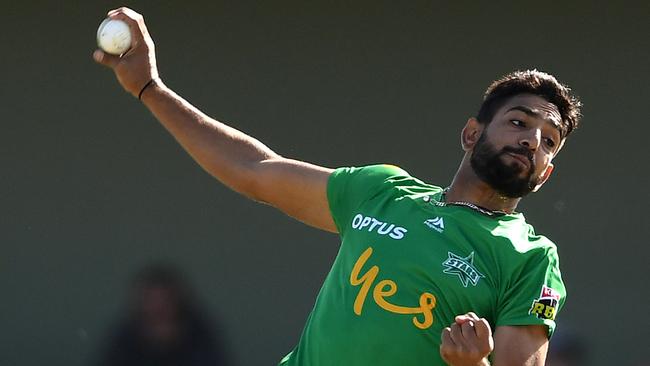 Haris Rauf charges in during his five-wicket haul against the Hurricanes.