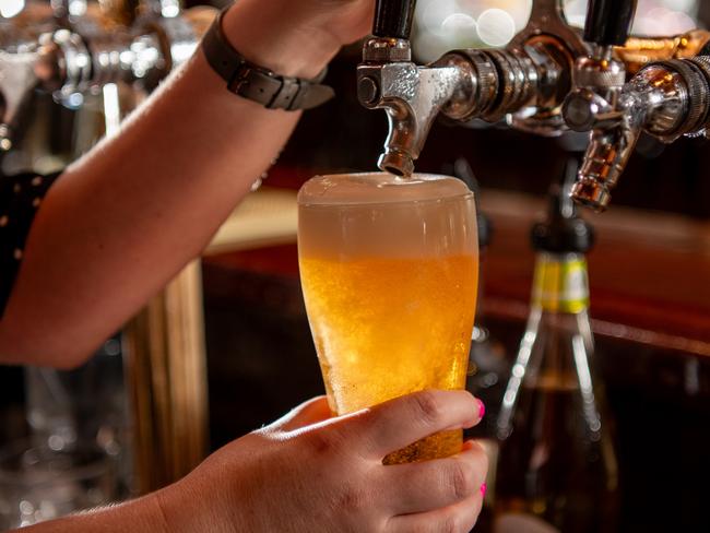 Generic imagery of beer pour at Hotel Darwin. Picture: Pema Tamang Pakhrin