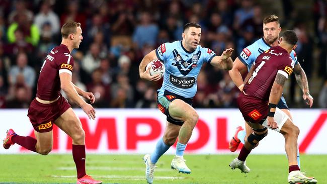 Leading from the front: James Tedesco makes a break for the Blues Picture: Getty Images