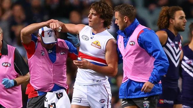 Liam Picken was assisted from the field against Fremantle and faces a fitness test. Picture: Getty Images