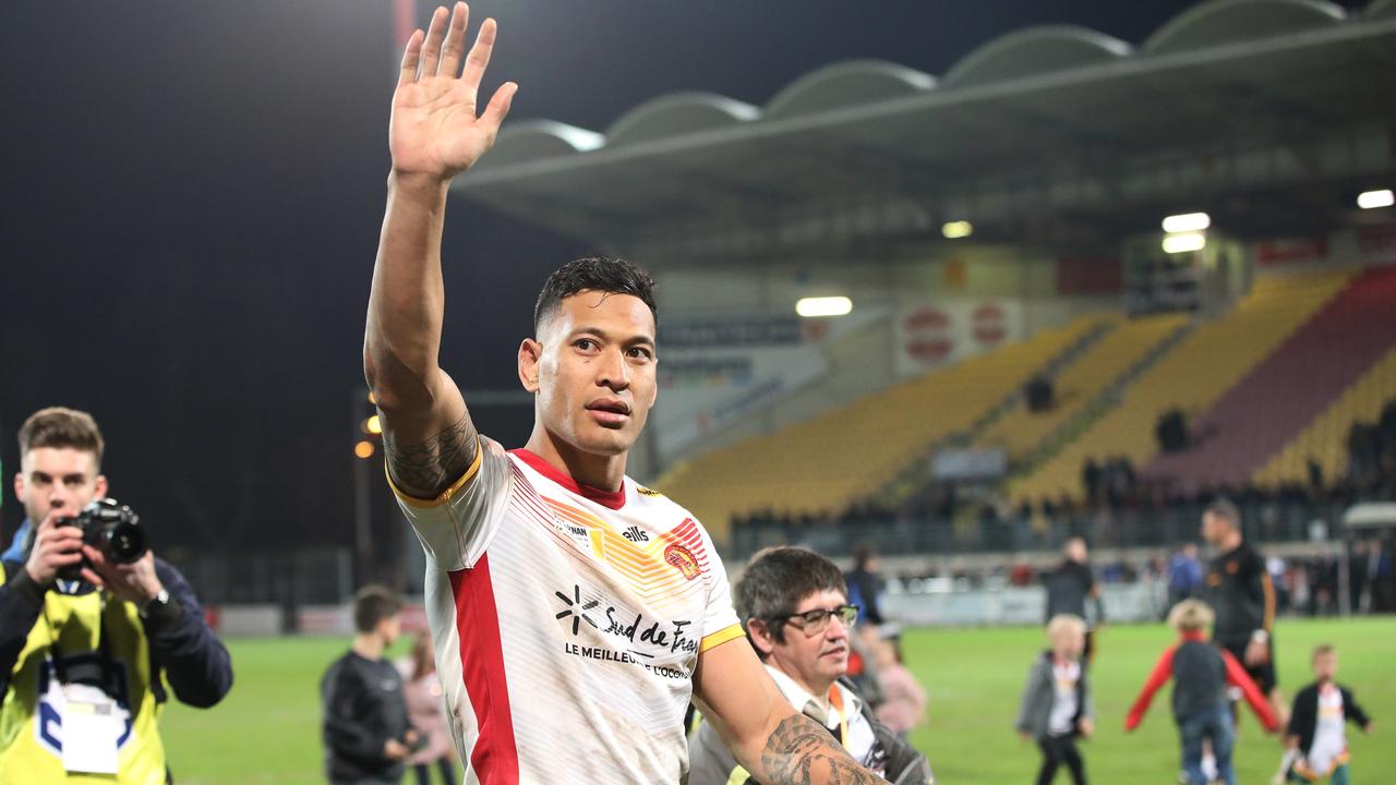 Israel Folau waves to the fans after his debut match for Catalans.