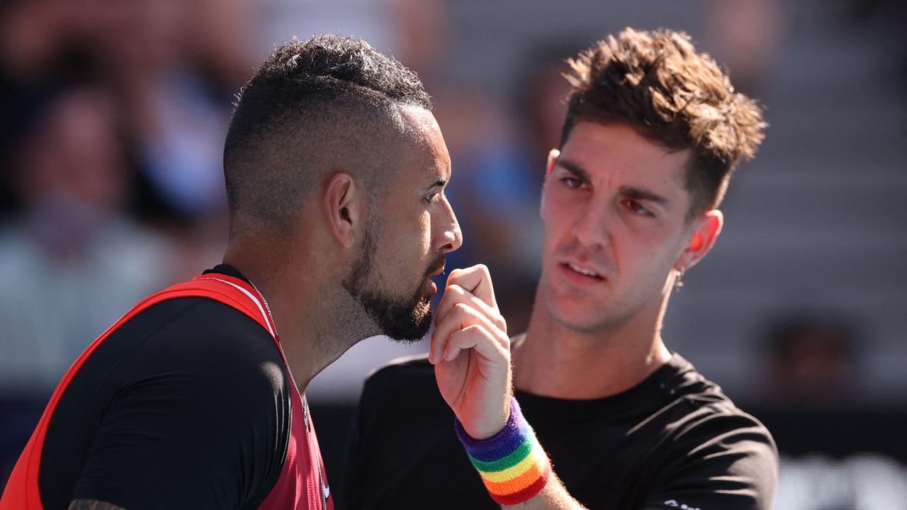 These boys are close. Photo by Martin KEEP / AFP