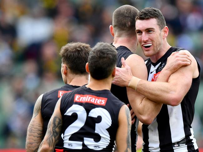 McStay is mobbed after kicking a goal. Picture: Josh Chadwick/Getty Images