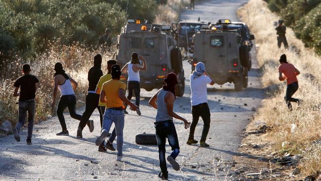 Palestinians clash with Israeli troops on the West Bank on Thursday. Picture: AFP