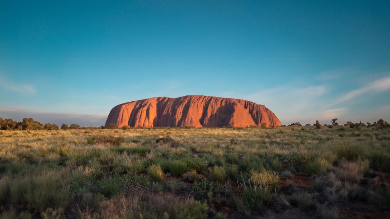 Uluru is a sacred site for the Anangu people and is listed on the UNESCO World Heritage register. Picture: Tourism NT