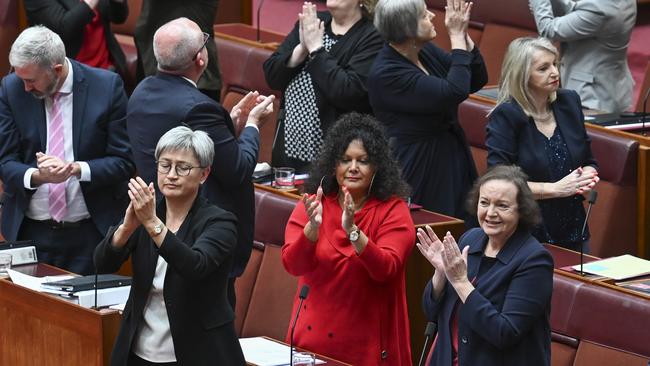 Penny Wong and Malarndirri McCarthy celebrate as the Constitution Alteration (Aboriginal and Torres Strait Islander Voice) passed in the Senate. Picture: NCA NewsWire / Martin Ollman